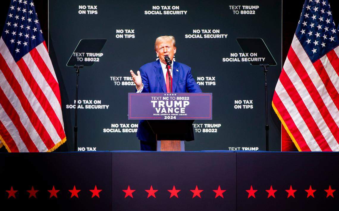 Former President Donald Trump takes the stage at the Thomas Wolfe Auditorium Wednesday afternoon in Asheville, N.C.