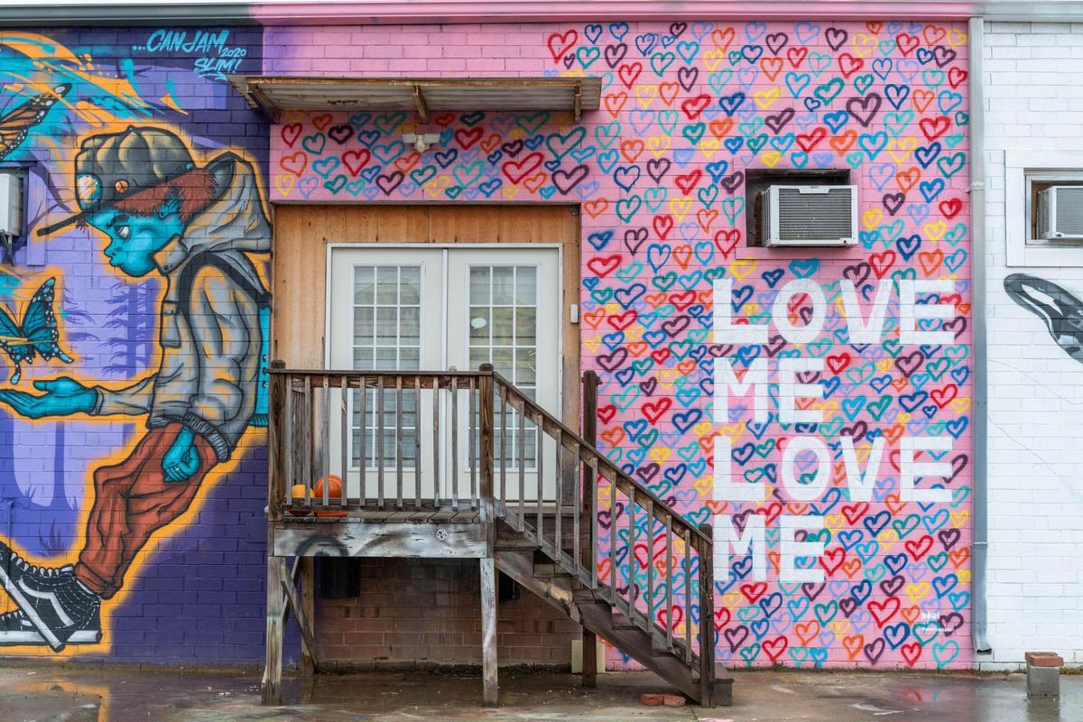 A mural by West coast artist @Poetwastaken at 3218 Benard Ave in NoDa.