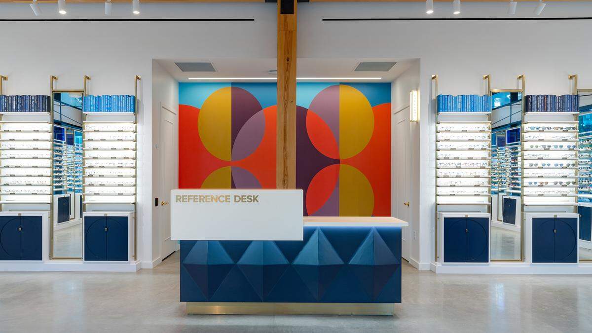 Custom artork at Warby Parker’s new store in Huntersville is by Durham artist Martha Clippinger.