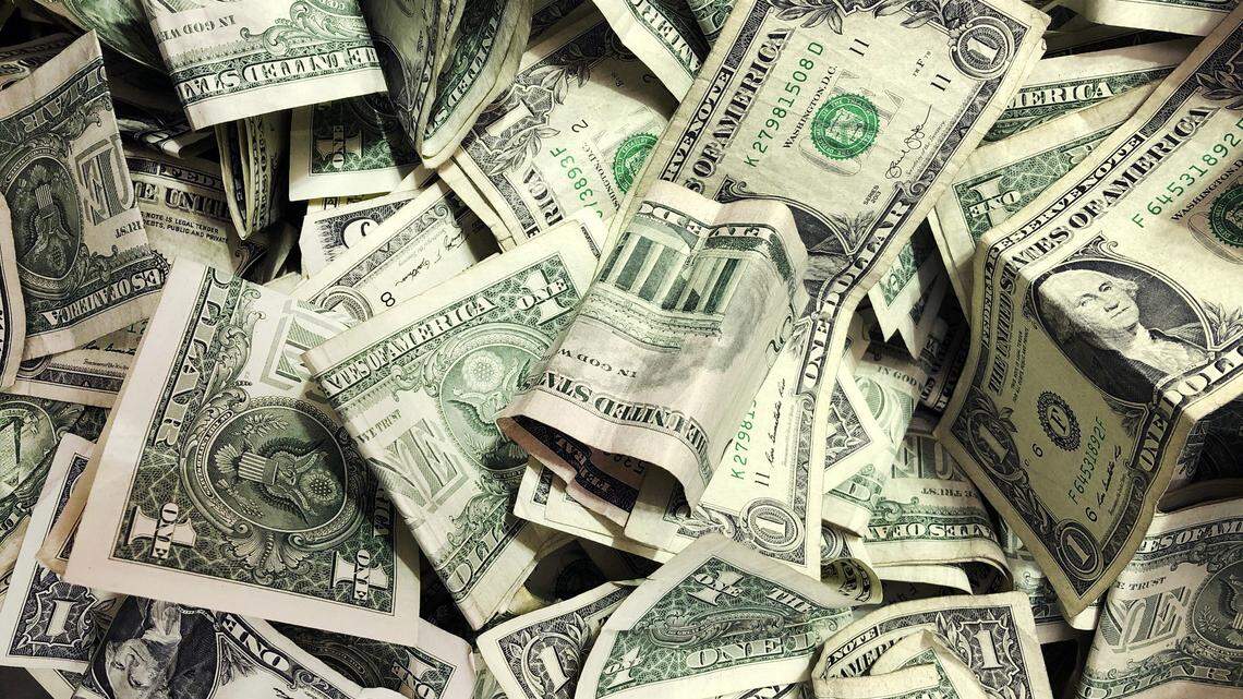 The man is believed to be responsible for at least eight robberies in the two states, the FBI said. (AP Photo/Mark Lennihan, File)