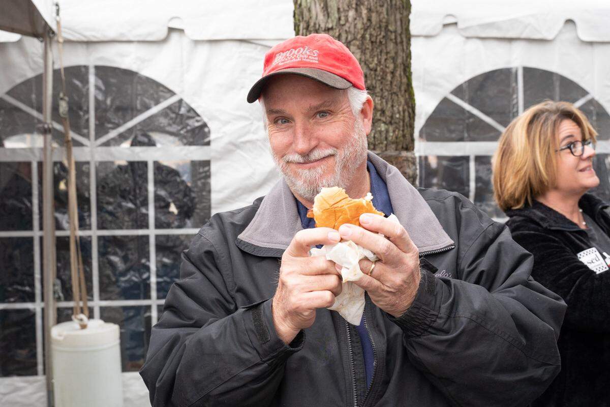 David Brooks, owner of Brooks’ Sandwich House, eats a burger on Saturday, Feb 1, 2020. The restaurant was temporarily closed after his brother, Scott, was killed in December 2019.