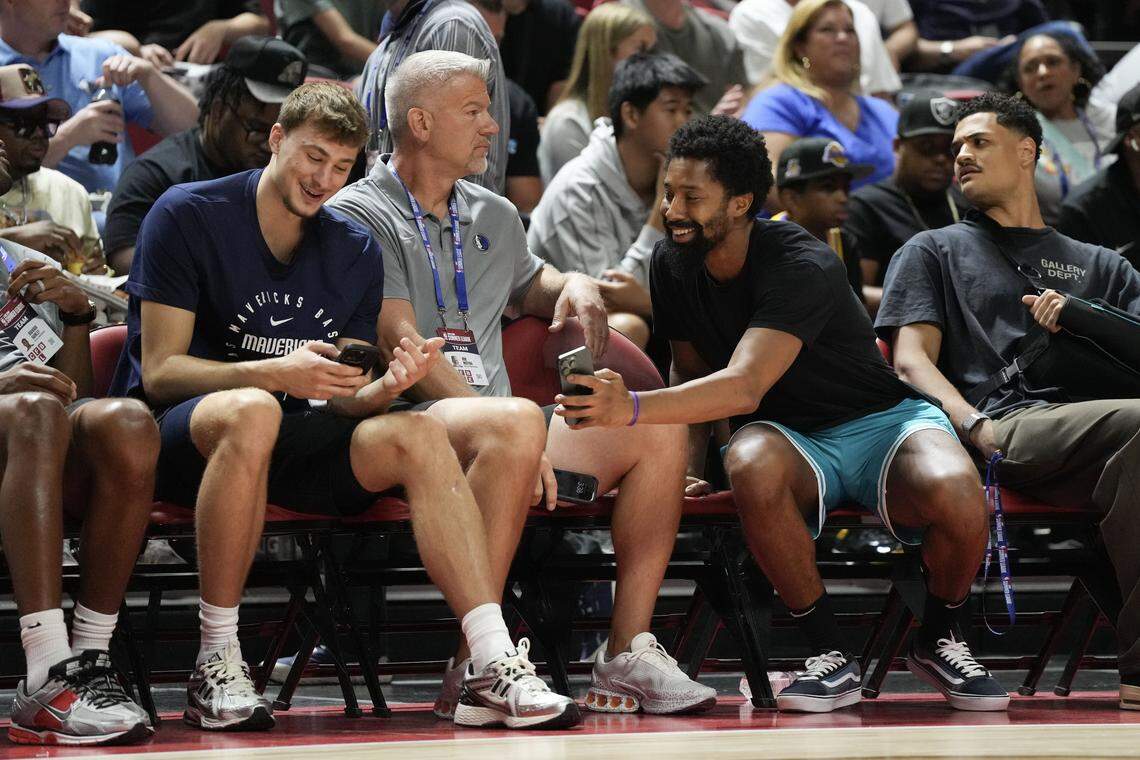 Dallas Mavericks forward Cooper Flagg and Charlotte Hornets player Spencer Dinwiddie during the Charlotte Hornets and Philadelphia 76ers game at Thomas & Mack Center.