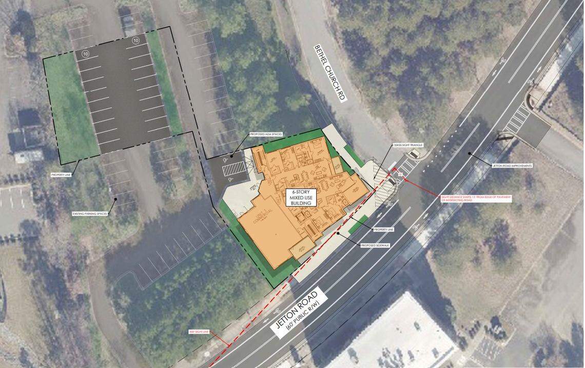 A Lake Norman couple plans to develop a mixed-use condominium building in Cornelius near the lake.