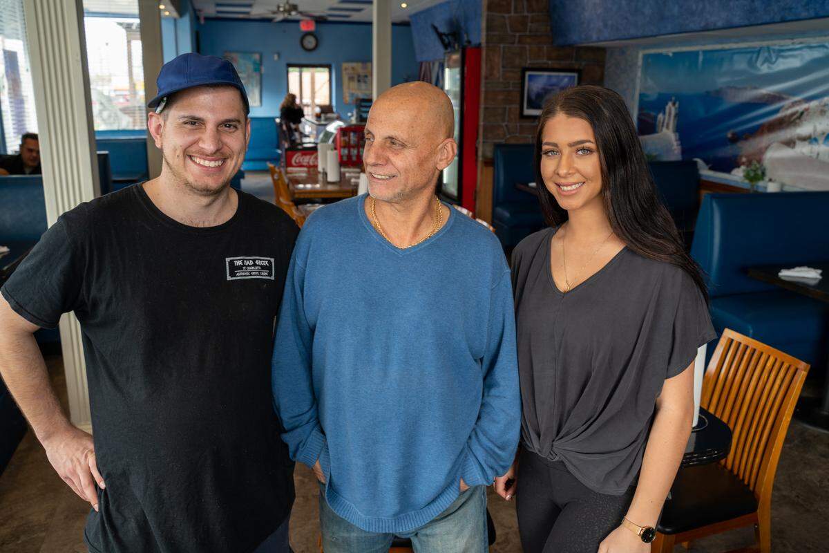 Peyton Limberakis, Christos Limberakis and Amelia Limberakis all help run and maintain The Mad Greek restaurant on South Boulevard.