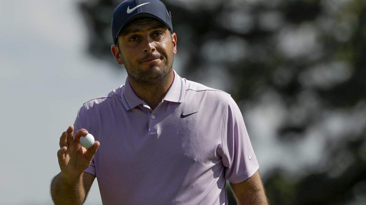 Francesco Molinari, of Italy, reacts on the eighth hole during the third round for the Masters golf tournament Saturday, April 13, 2019, in Augusta, Ga. (AP Photo/Marcio Jose Sanchez)