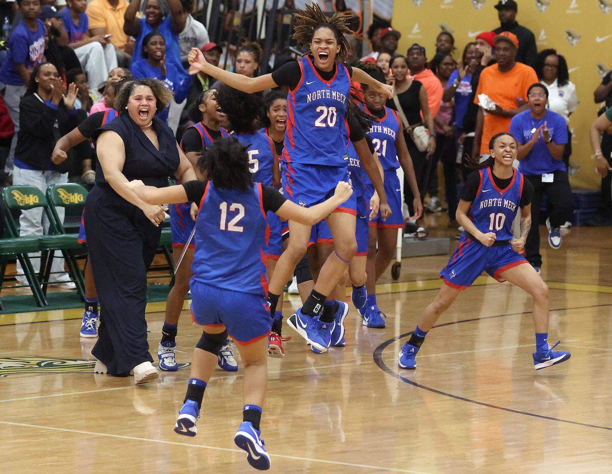 The North Meck girls basketball team celebrate their win over Mallard Creek in the Power Six Conference Tournament action on Friday, February 20, 2026 at Independence High School.