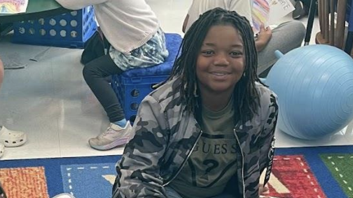 Mikey Malanda sits on the rug in his sixth-grade classroom at Lake Norman Charter School in Huntersville, where teachers and students knew him as “Big Mike.”