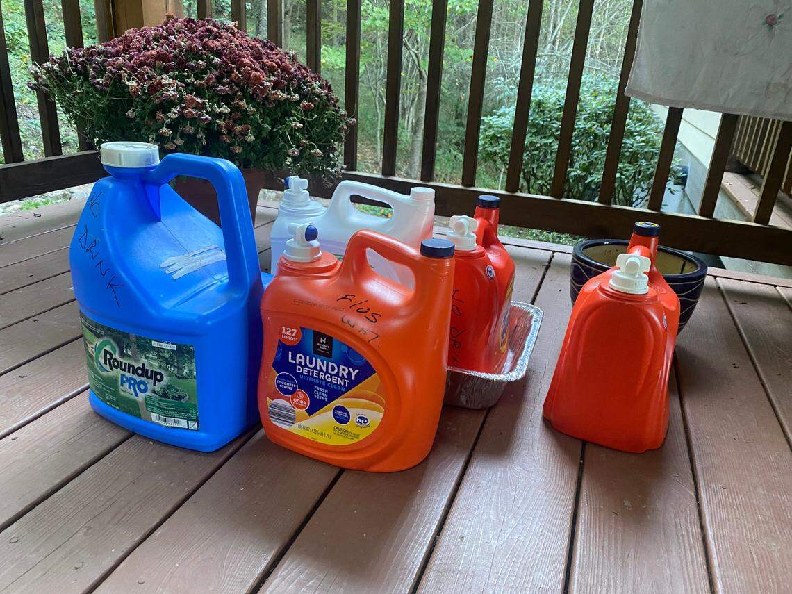 Gathering water from the creek for washing and toilet flushing means reusing plastic jugs.