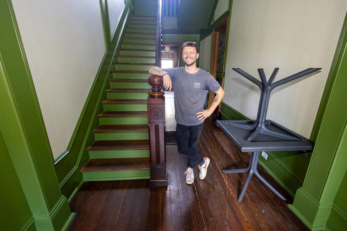 Chef Kendall Moore stands inside Spaghett, which is set inside the 125-year-old Morrison House in Charlotte’s 4th Ward.