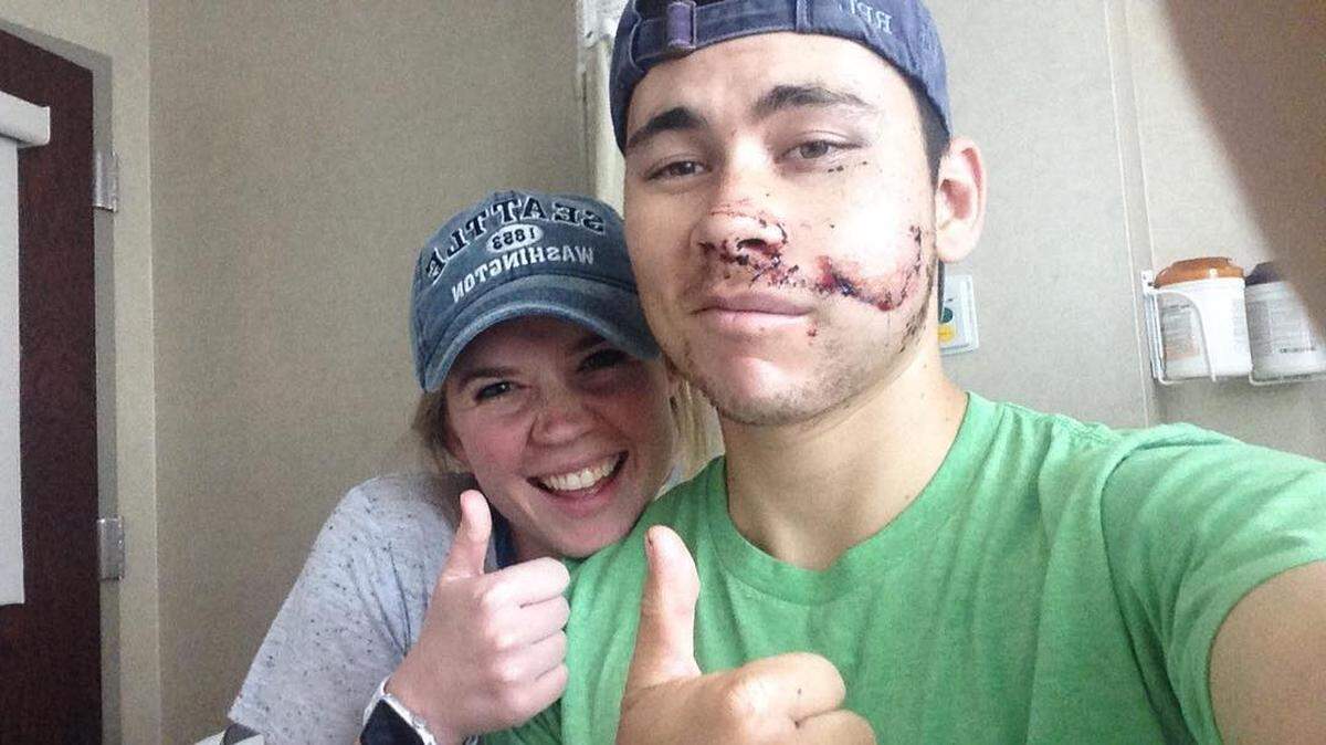 Robert Lyew with his girlfriend Callie Rumfelt, shortly before he was discharged from Carolinas Medical Center on Monday.