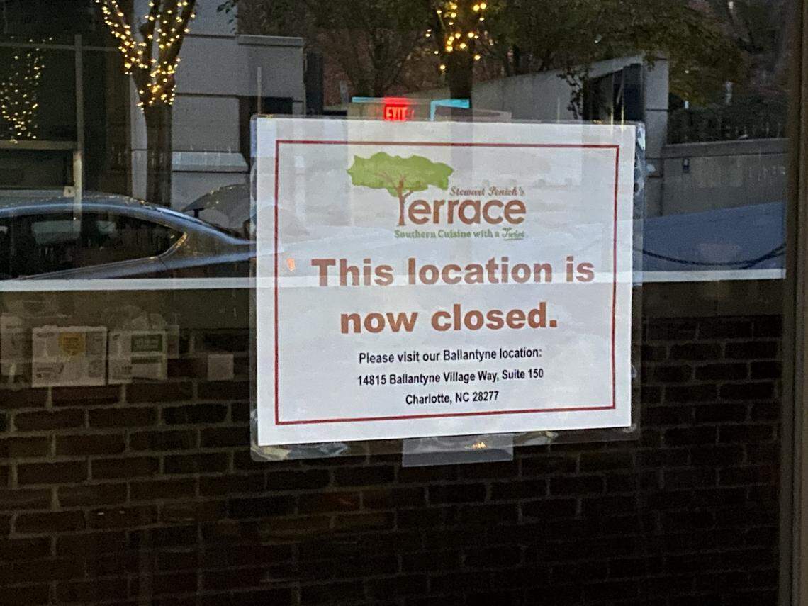 Signs on the doors of Stewart Penick’s Terrace announced the location is closed and referred customers to the Ballantyne location.