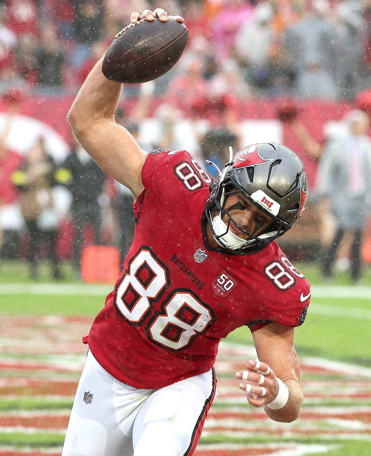 Tampa Bay Buccaneers tight end Cade Otton spikes the football after scoring the team’s first touchdown against the Carolina Panthers at Raymond James Stadium in Tampa, FL. on Saturday, January 3, 2026. The Buccaneers defeated the Panthers 16-14.