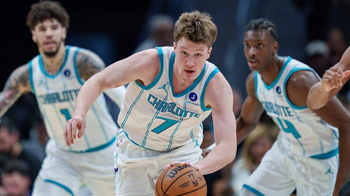 Kon Knueppel of the Charlotte Hornets brings the ball up court.