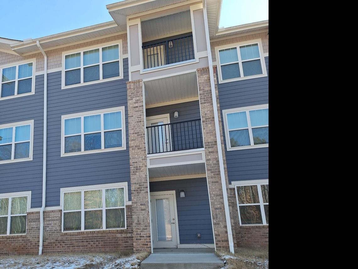 Vacant three-story apartment buildings line streets in the Pointe at Caldwell Station apartment complex off N.C. 115 in Huntersville on Thursday, Feb. 20, 2025.