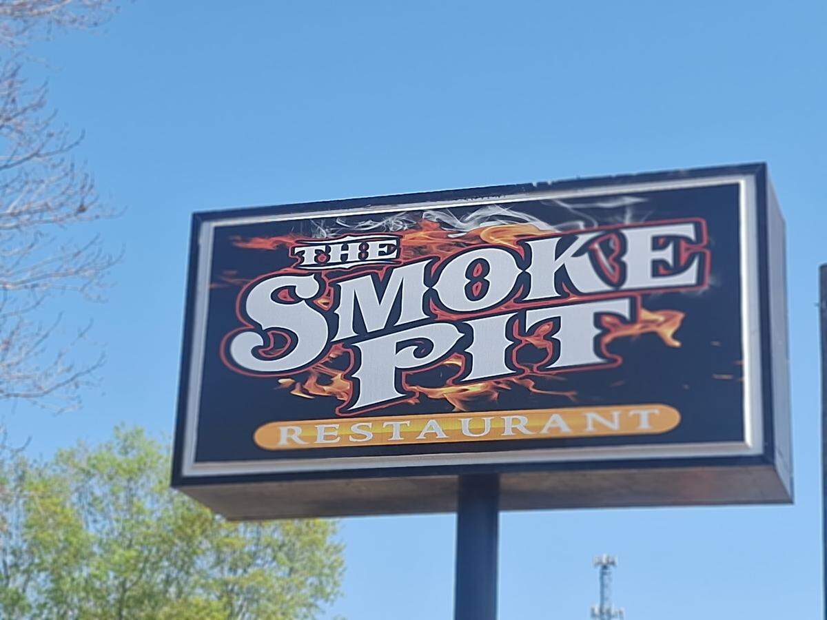 This sign outside the Smoke Pit barbecue restaurant faces West Plaza Drive (N.C. 150) in Mooresville. The restaurant opened Tuesday, March 31, 2026.