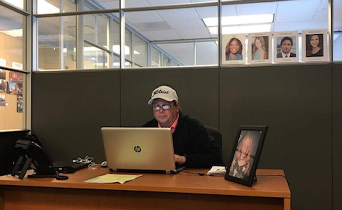 Stuart Stout works in his office at the production facility. Over his shoulder hang photos of actors who the producers had gotten commitments from, including Queen Latifah, Kyla Matthews, Luke Wilson (who was to play Stuart) and Rebecca Nicole Ray (who was to play Austin Stout, Hope’s older sister).