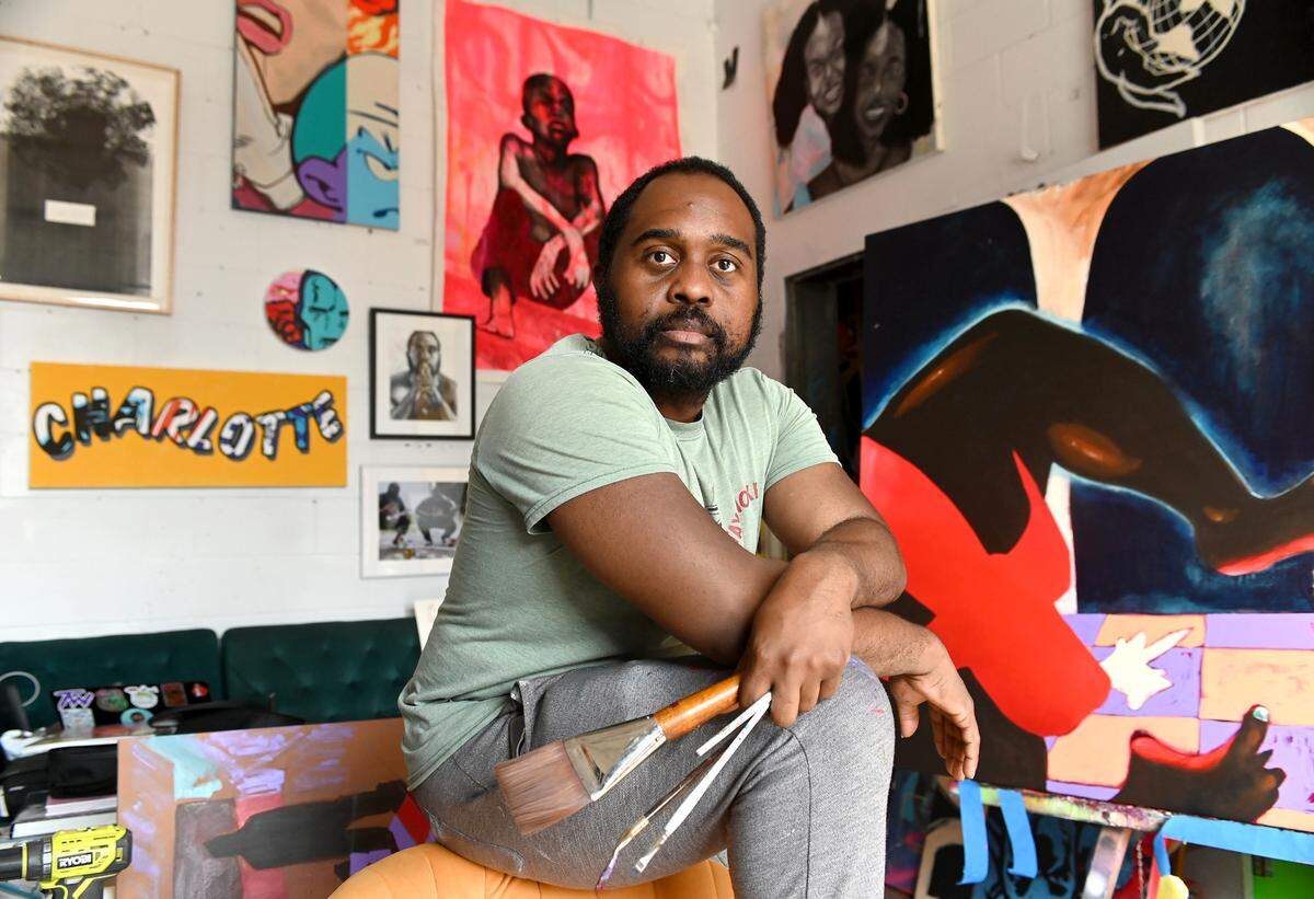 Dammit Wesley, a now vivacious and renowned Charlotte artist, was once a bright-eyed 19-year-old who became enthralled by the familiar glow of the city’s night skyline during driving trips to the area.