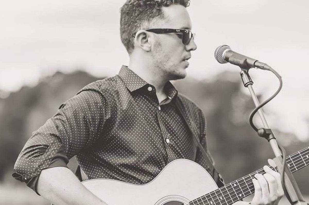 Dean Peterson of Heroes at Last performs live at The Improper Pig Rea Farms on July 10.