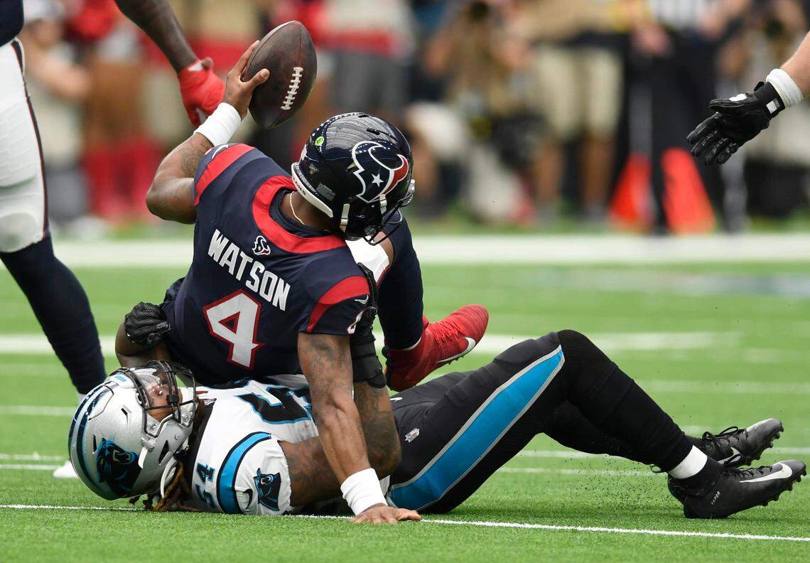Carolina Panthers outside linebacker Shaq Thompson (54) sacks Houston Texans quarterback Deshaun Watson (4) in the first half at NRG Stadium in Houston, Texas on Sunday, September 29, 2019.