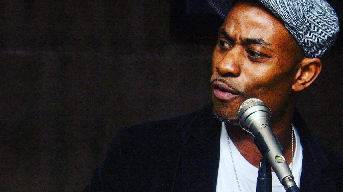 Spoken word artist Jah Smalls performing at Chima Steakhouse in uptown Charlotte. Smalls’ writing is based around acknowledging trauma. Poems he wrote to his daughter, Mianna Smalls, to help her cope with depression have been published in a book.