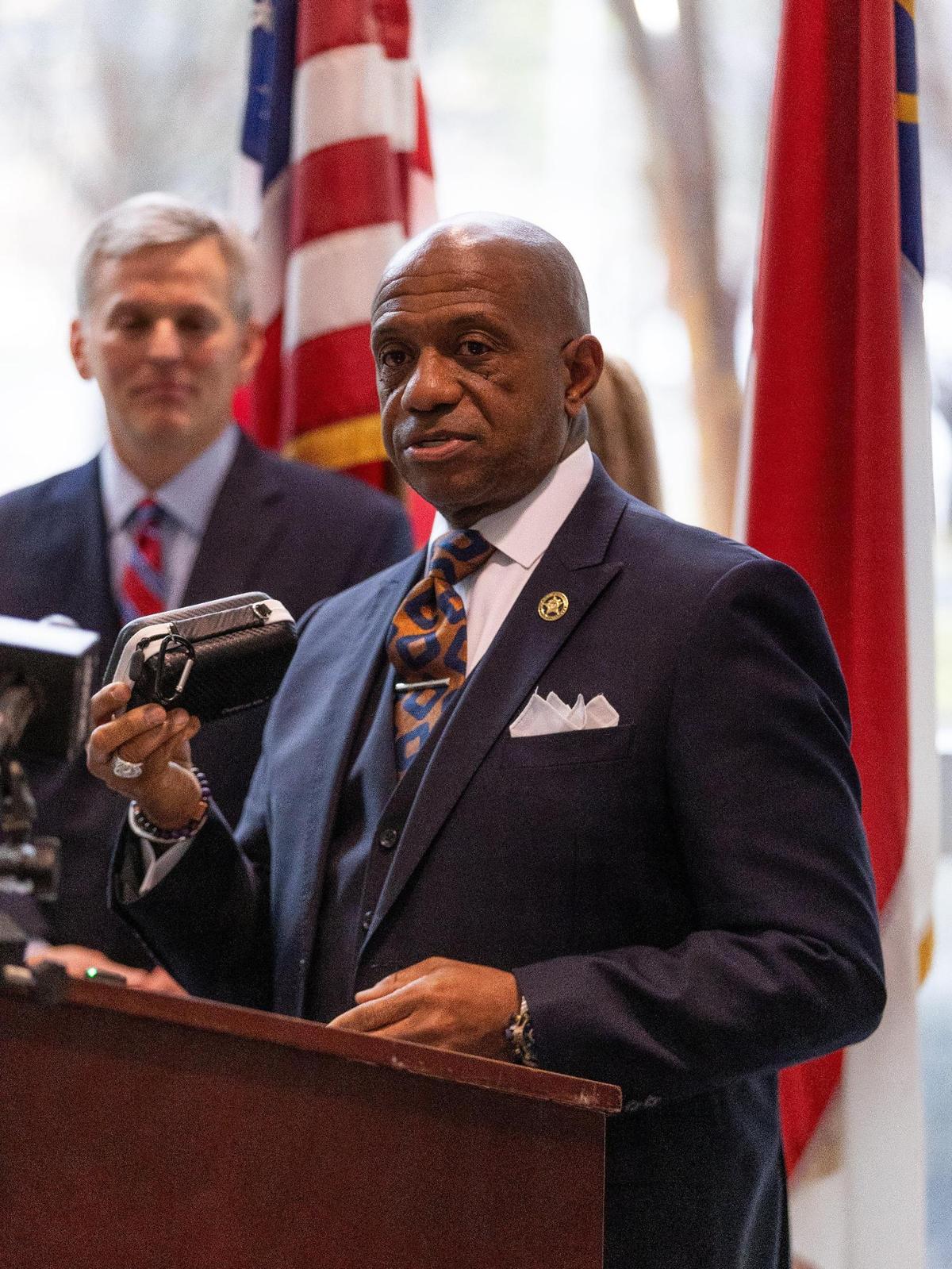 Mecklenburg County Sheriff Garry McFadden holds an overdose prevention kit during a press conference at the Mecklenburg County Sheriff’s Office in Charlotte on March 27, 2024.