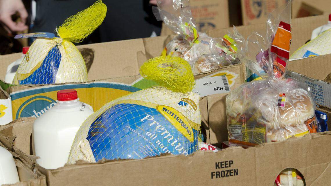 Turkeys and the rest of the fixings for a Thanksgiving meal were distributed at the Johnston YMCA by Loaves & Fishes Friendship Trays on Friday, Nov.19, 2021.