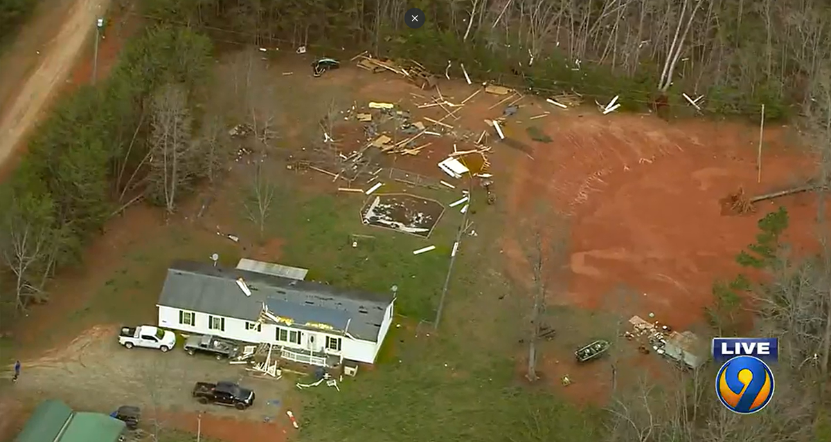 This image, taken by WSOC’s drone camera, shows damages on and around a home in Alexander County, NC, on Thursday, March 24, 2022.