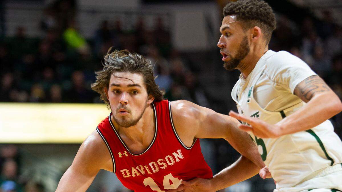 Davidson’s Luke Frampton (left) is taking a personal leave of absence from the team.