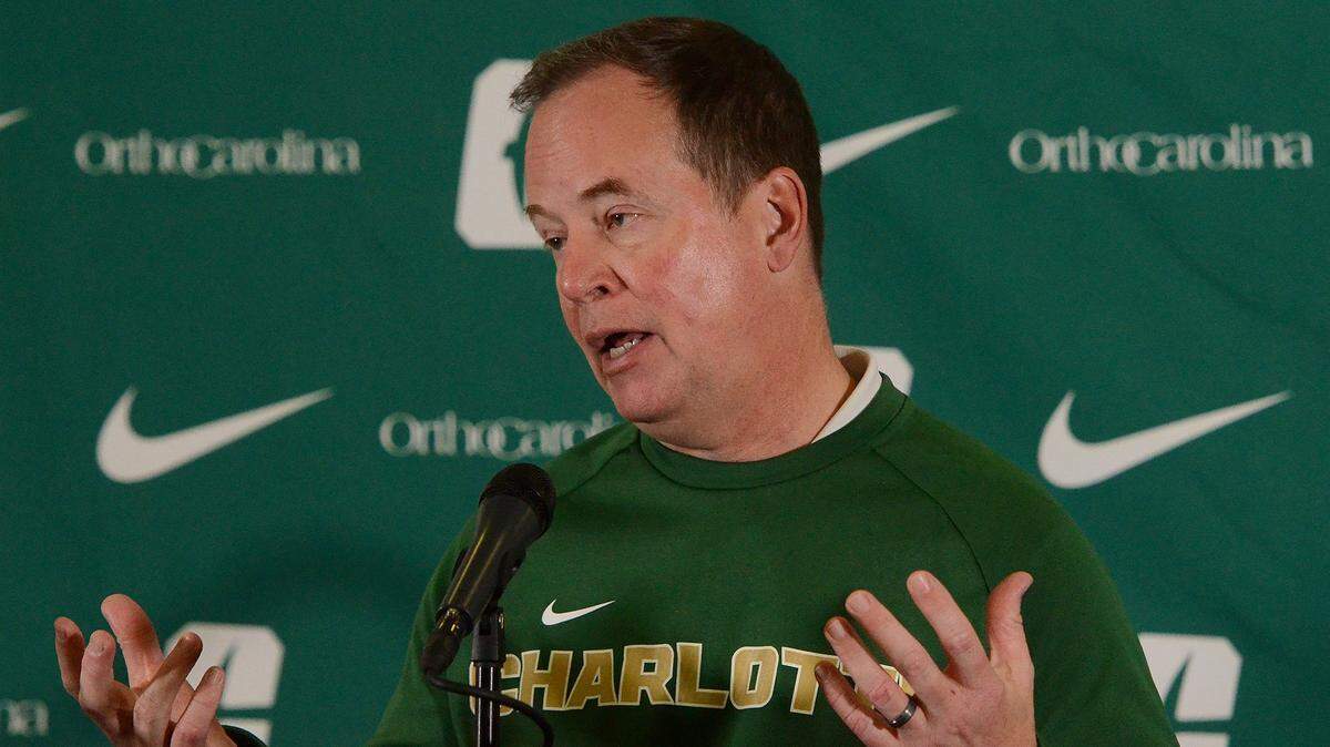 Charlotte 49ers Director of Athletics Mike Hill discusses the decision to fire head football coach Biff Poggi during Tuesday’s press conference at the Judy Rose Center on UNCC’s campus.