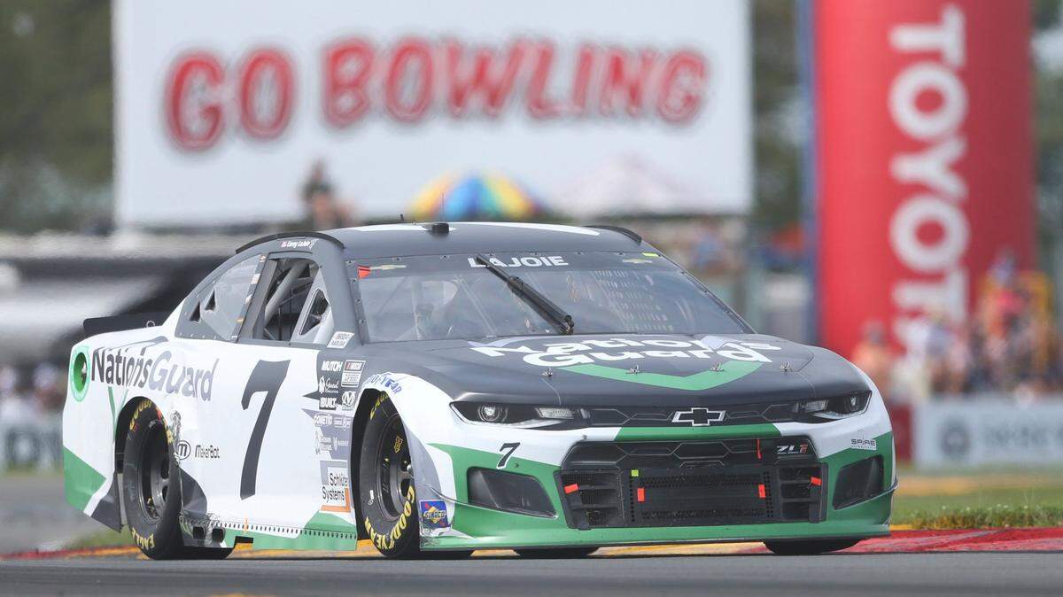 Corey LaJoie drives through the Bus Stop during a NASCAR Cup Series auto race in Watkins Glen, N.Y., on Aug. 8. LaJoie will miss this weekend’s race due to COVID-19.