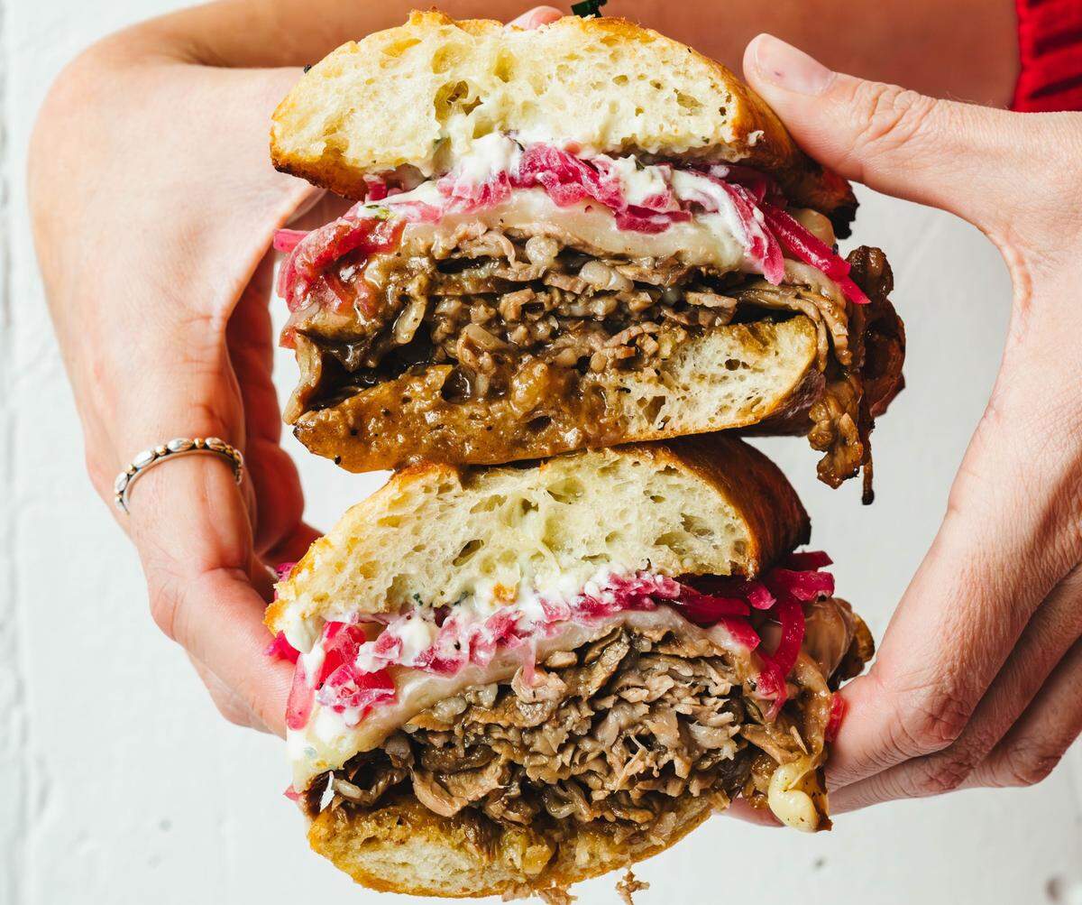 Hornets fans can find the Prime Rib Sandwich with au jus from Dressler’s at the Wicked Weed Cart by section 116 at the Spectrum Center.
