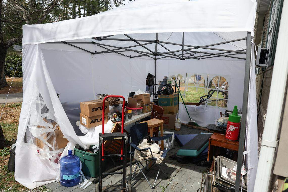 A canopy tent on the front lawn was a temporary kitchen for Delia Lytle Bayley and her family since floods wrecked her family’s house in Black Mountain. The temporary kitchen is now in a large shed donated by Samaritan’s Purse, situated behind the two trailers Lytle Bayley lives in with her husband and 16-year-old son.