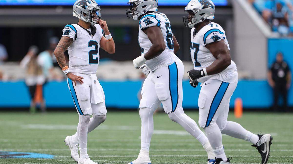 Panthers quarterback Matt Corral, left, waits for teammates after a scoreless series during the pre-season game against the Jets at Bank of America Stadium on Saturday, August 12, 2023 in Charlotte, NC.