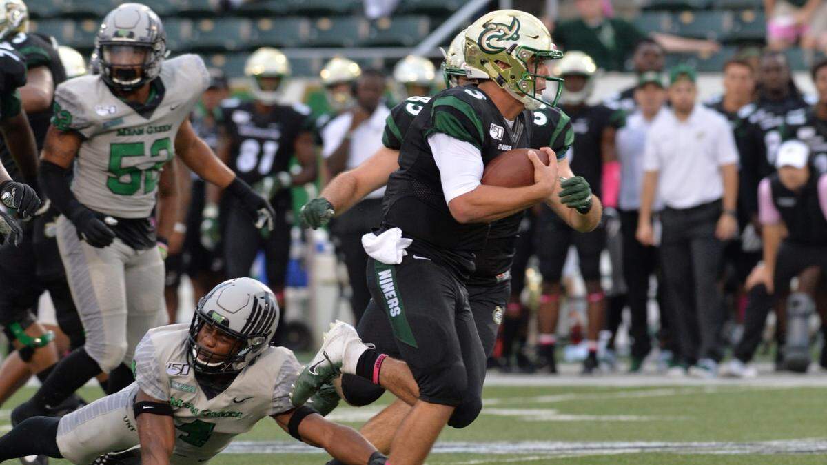 Charlotte 49ers quarterback Chris Reynolds not only threw for 336 yards and three touchdowns, but he ran for 96 yards and scored once.