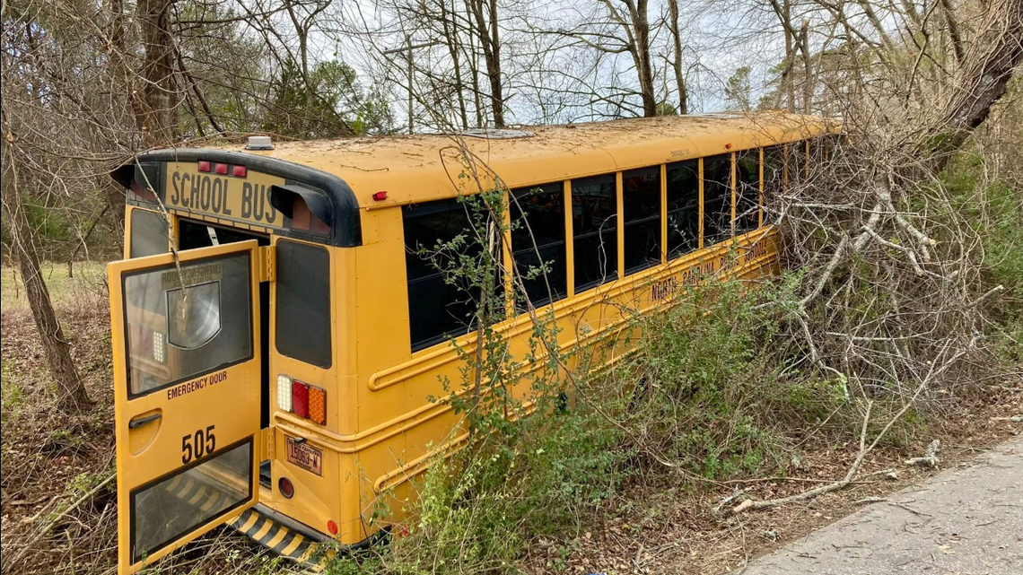 Gastonia school bus carrying students crashes into woods; minor injuries