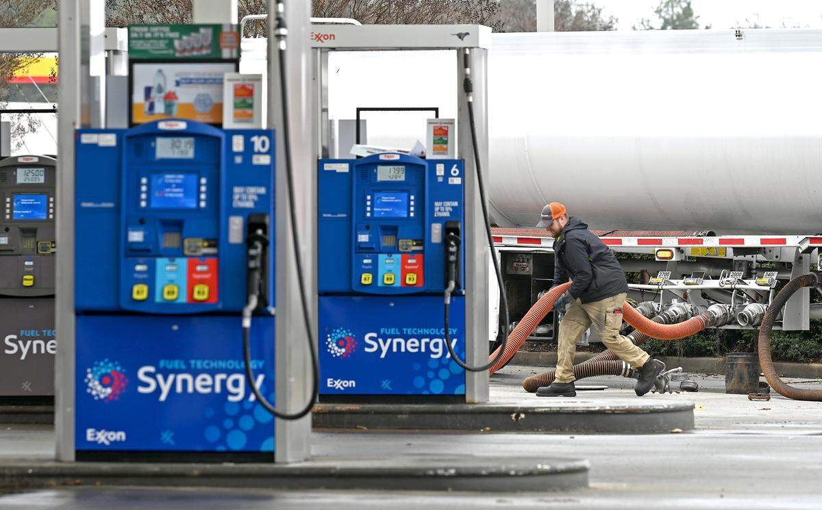 The fuel tanks at the Exxon/7-11 station on Hwy. 74 in Matthews are refilled on Wednesday, March 9, 2022. The national average price for a gallon of gas – $4.06 – has reached its highest point since July 2008, according to AAA