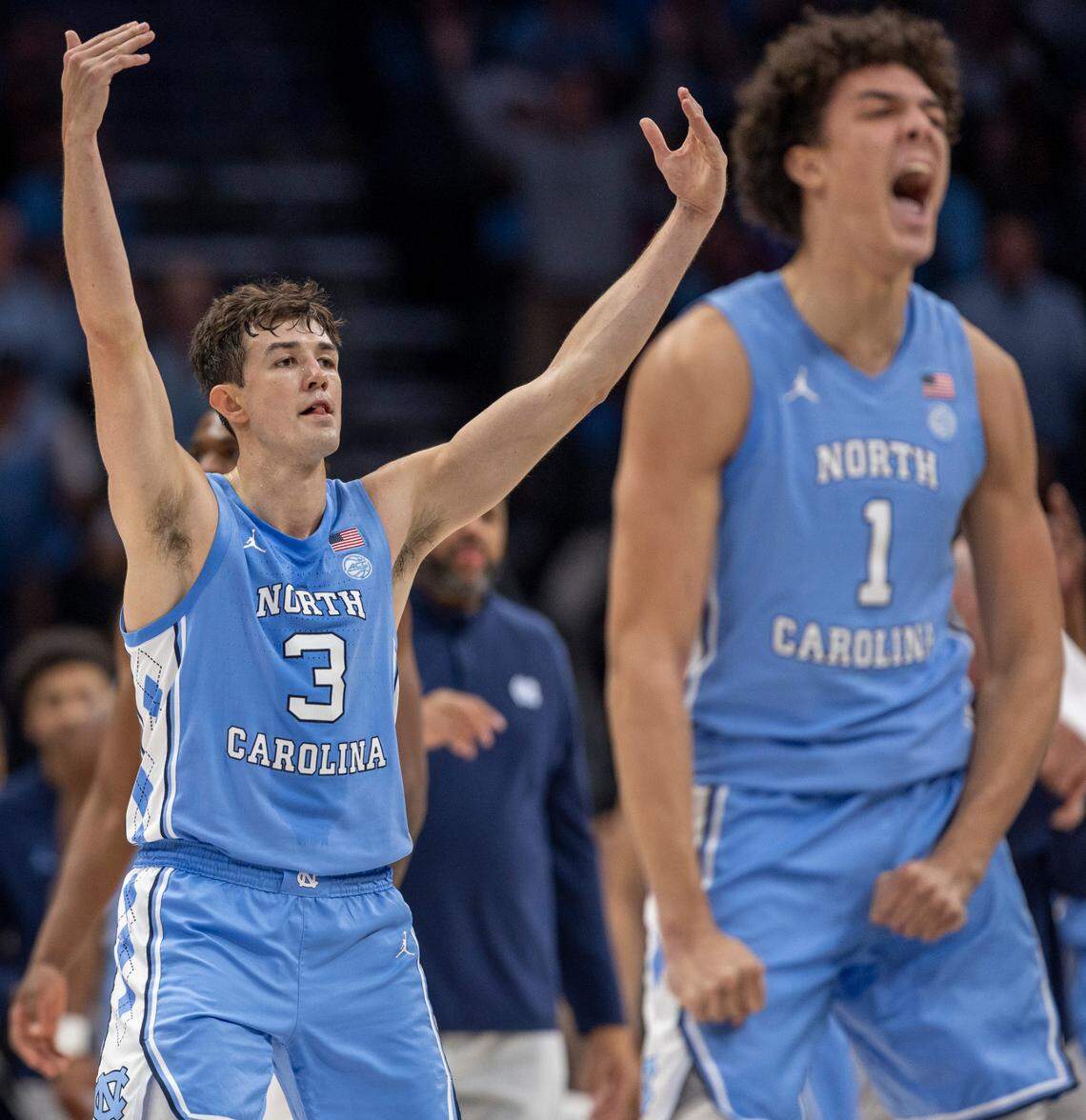 North Carolina’s Cormac Ryan (3) and Zayden High (1) work the crowd as the Tar Heels open a 57-43 lead over Oklahoma in the second half on Wednesday, December 20, 2023 at the Spectrum Center in Charlotte, N.C.