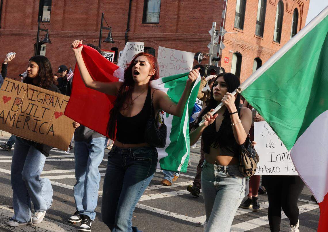 Demonstrators chant during the No Border Patrol protest in Uptown Charlotte on Saturday, Nov. 15, 2025.