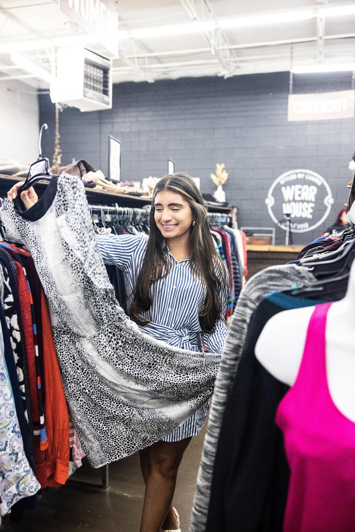 Paola Garcia, spokeswoman for The WearHouse, a thrift store run by the nonprofit Camino, said the shop is seeing an increase in thrifting amid rising inflation.