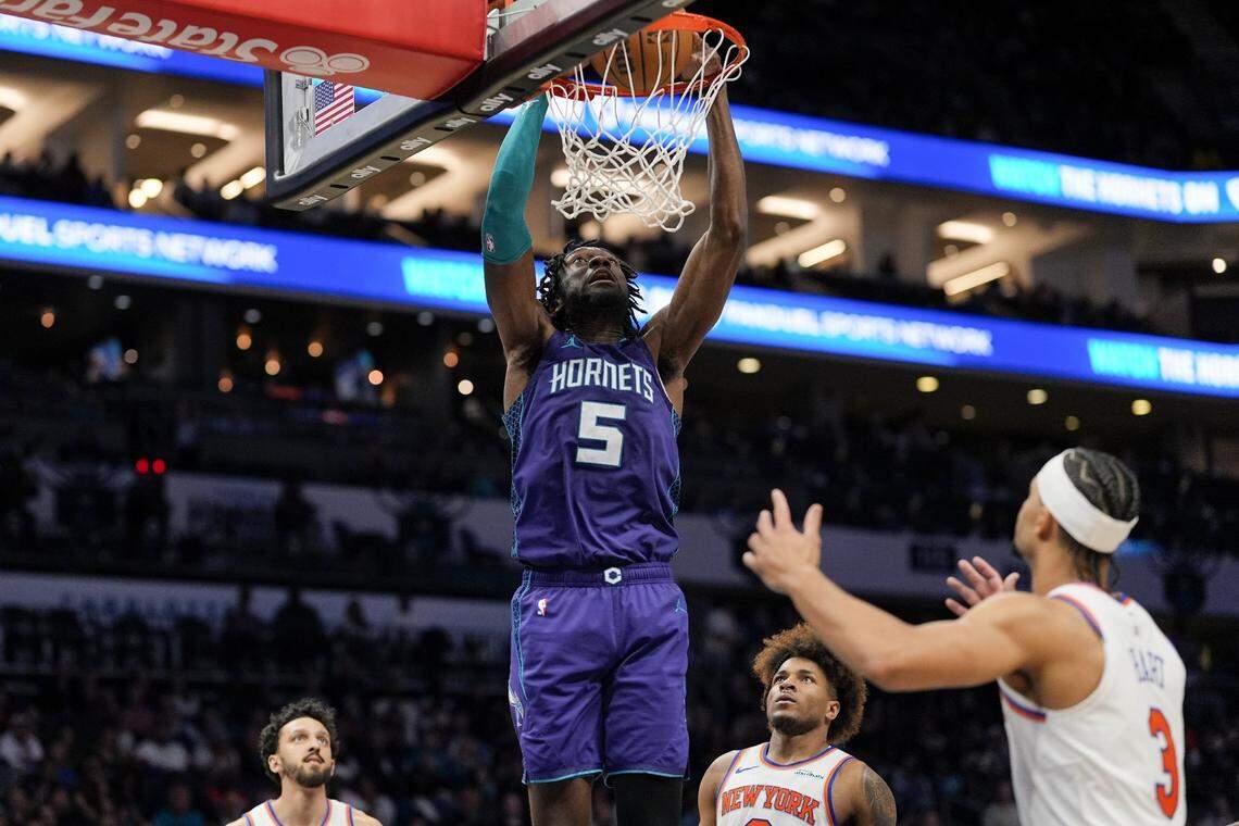 Charlotte Hornets center Mark Williams (5) with a dunk against the New York Knicks during the second half at Spectrum Center.