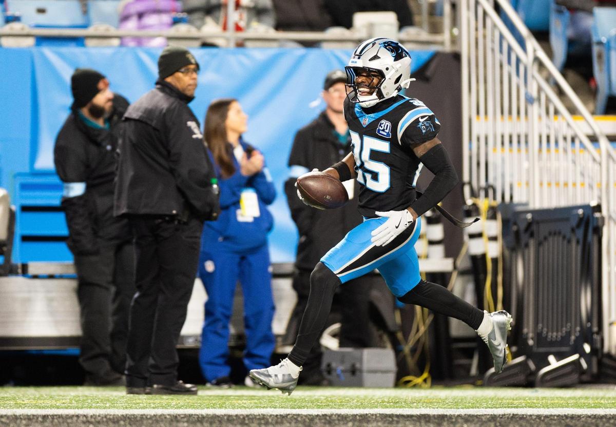 Carolina Panthers safety Xavier Woods celebrates an interception against the Tampa Bay Buccaneers at the Bank of America Stadium in Charlotte, N.C., on Sunday, December 1, 2024.