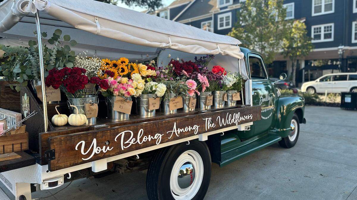 Bentley’s Buds and Brews is a vintage truck delivering handcrafted bouquets and cold brews.