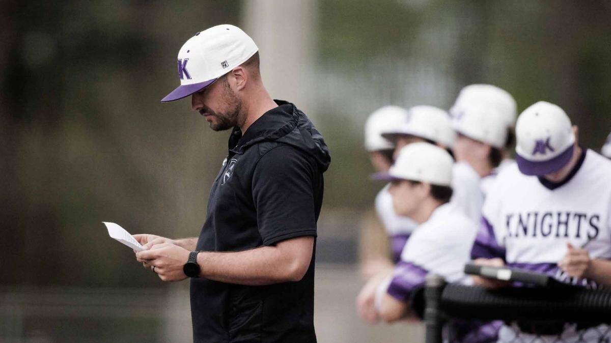 Ardrey Kell baseball head coach Sean Thomas (left) has resigned to take a training position in Cabarrus County.