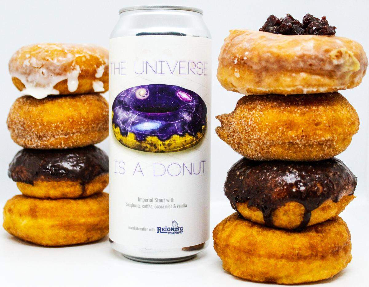 The Universe is a Donut imperial stout at Divine Barrel is brewed with vanilla, cocoa nibs, lactose, Magnolia Coffee and Reigning Doughnuts’ glazed doughnuts.