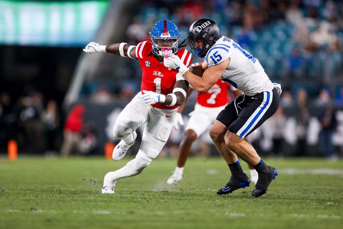 Ole Miss edge rusher Princely Umanmielen works against Duke tight end Jake Taylor during their 2024 game.