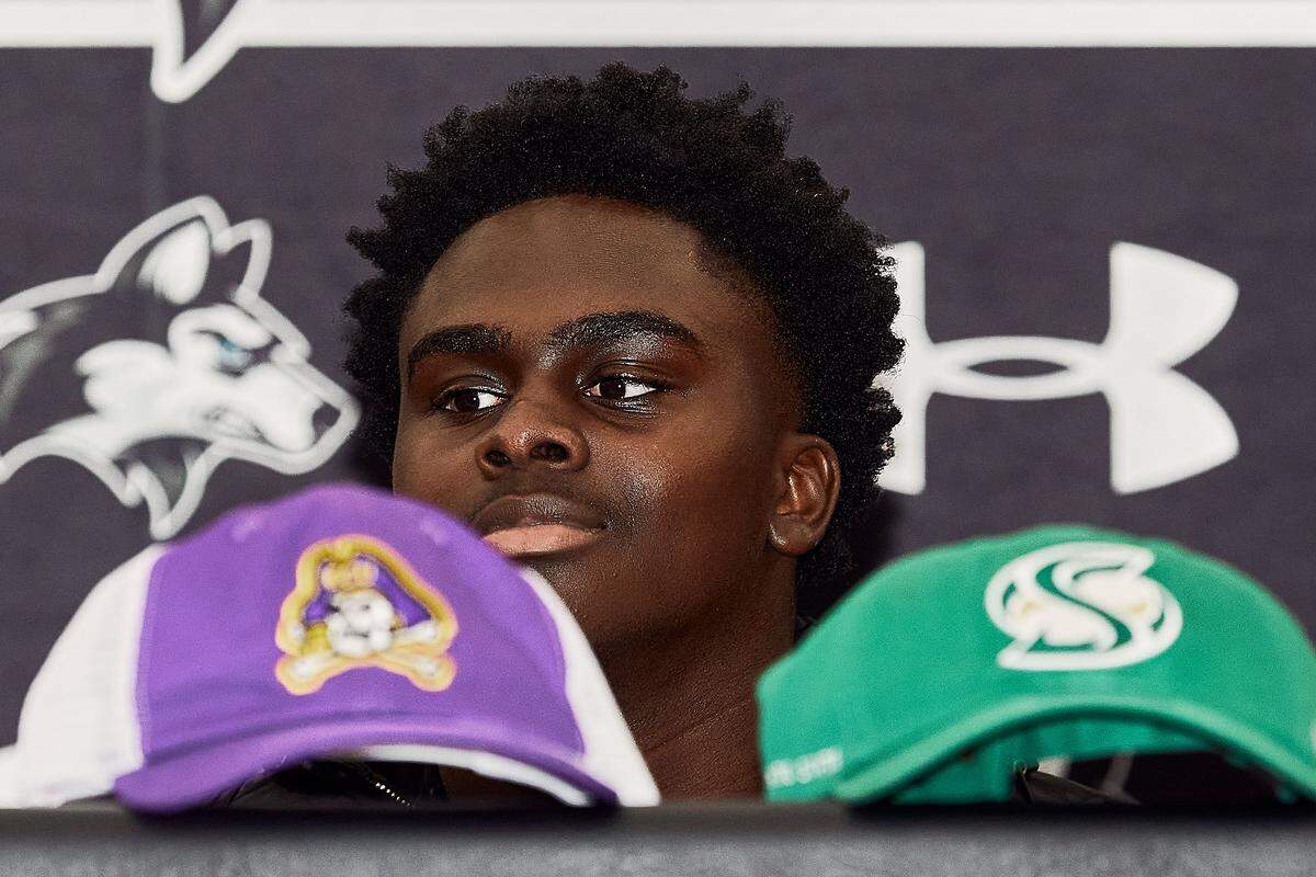 Hough High's LJ Porter, a top high school football recruit in North Carolina, announces his college decision to East Carolina at Hough High School in Cornelius, NC.