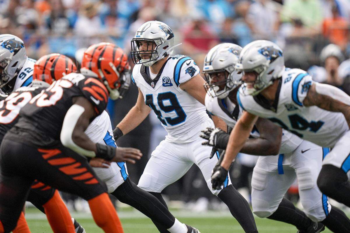 Sep 29, 2024; Charlotte, North Carolina, USA; Carolina Panthers linebacker Jon Rhattigan (49) during the fourth quarter against the Cincinnati Bengals at Bank of America Stadium. Mandatory Credit: Jim Dedmon-Imagn Images
