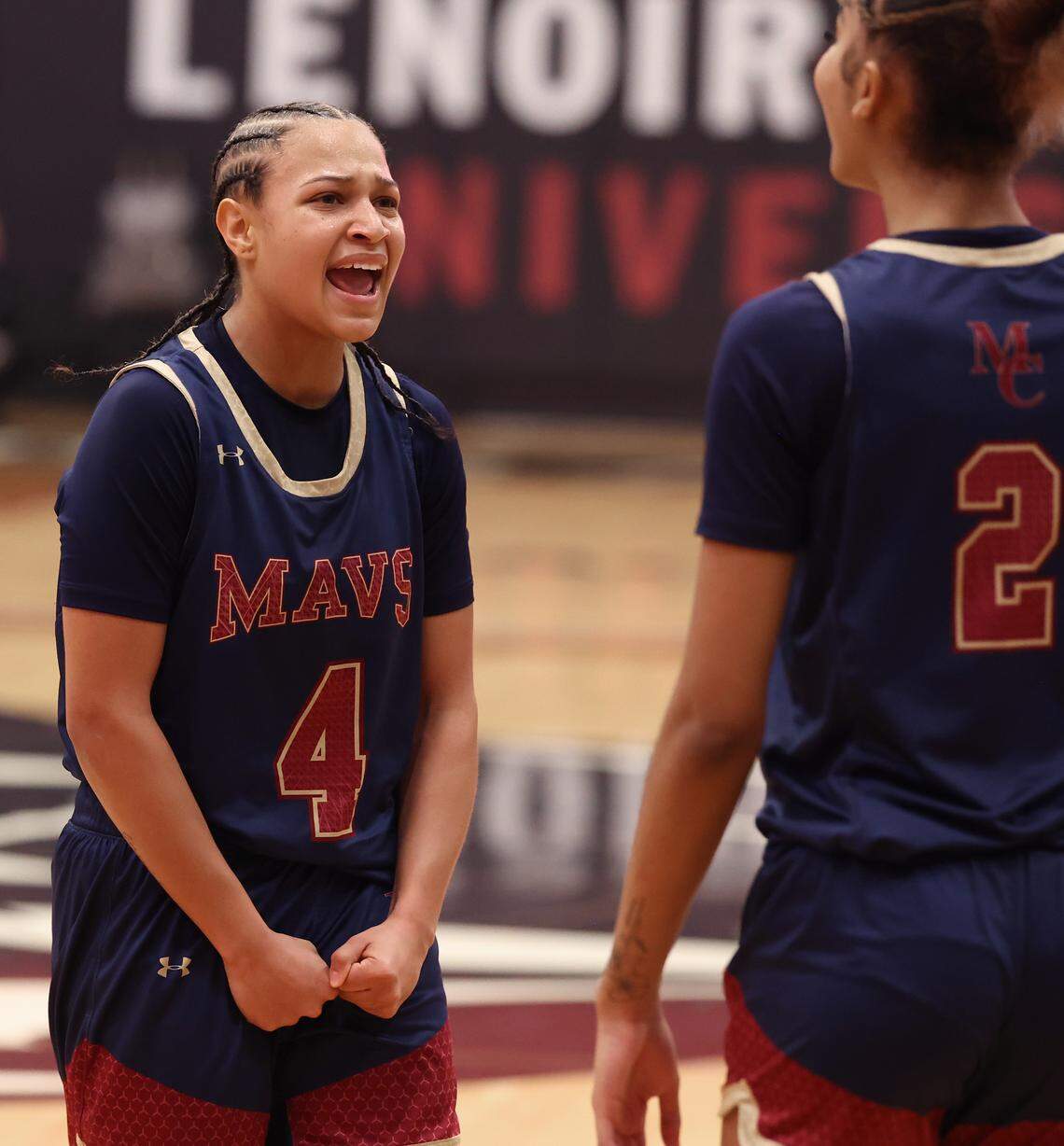 Mallard Creek’s Kiara Anderson, left, celebrates a play with teammate My’Asia Young, right, during action against Ardrey Kell in the NCHSAA 8A girl’s regional championship game on Wednesday, March 4, 2026 at Lenoir-Rhyne University in Hickory, NC. Mallard Creek defeated Ardrey Kell 59-44. 