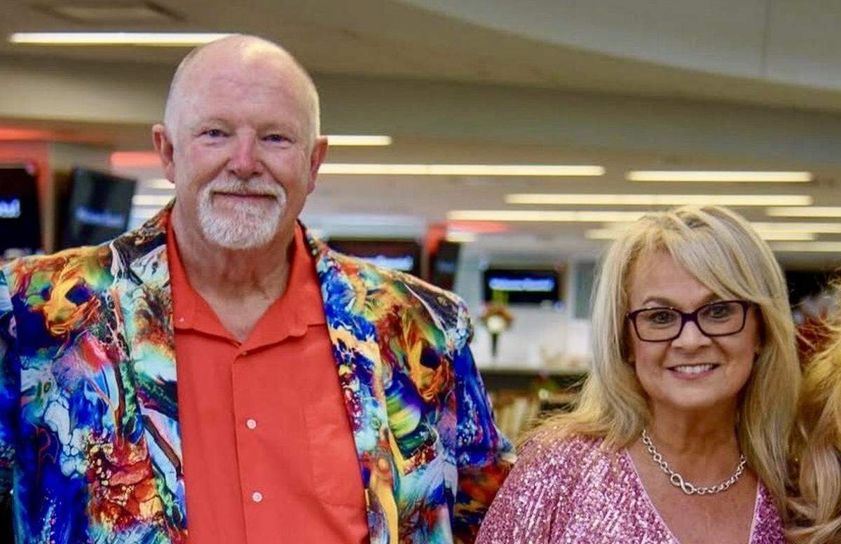Craig Wadsworth, left, poses for a picture in Daytona Beach with Traci Hultzapple. Wadsworth, 64, died in a plane crash in Statesville on Thursday, Dec. 18, 2025.