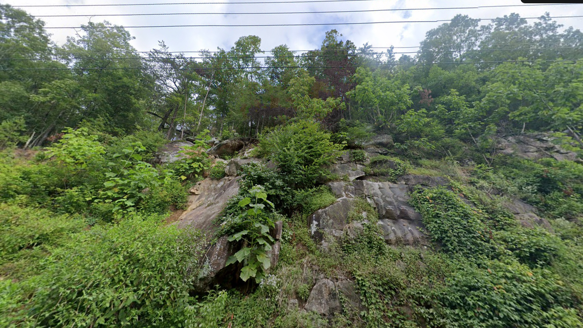 The rescue took place about eight miles north of Great Smoky Mountains National Park, where steep bluffs like this are often found along narrow roads and driveways.